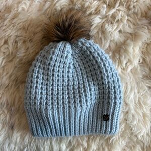 Helly Hansen Light Blue Knit Beanie with Brown Pom-Pom